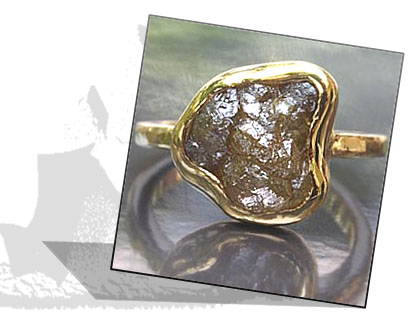 Rough diamond engagement ring with bezel setting
